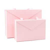 Boîte cadeau pliable magnétique avec logo personnalisé emballage en papier noir emballage en carton rigide pour cosmétique avec poignée