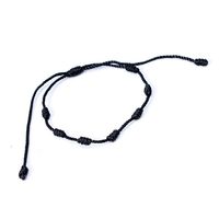 Bracelet en corde rouge tissé à la main en Perou, sept nœuds, rouge et noir, pour femmes
