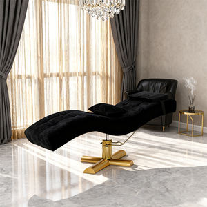 Lit de massage moderne incurvé doré pour salons de beauté Lit de tatouage en cuir noir pour cils et sourcils Rotatif et réglable pour la salle de sport - Product Image 5