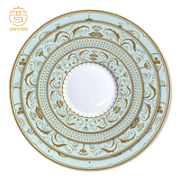 Service de table en céramique bleu turquoise avec motifs floraux dorés, vaisselle en porcelaine fine pour événements et traiteurs