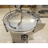 Machine d'emballage automatique à plateau tournant rotatif pour le désagréglement et le tri des bouteilles en plastique et en verre