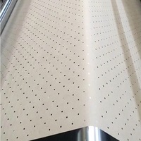 Precio de fábrica barato Kraft perforado Underlay papel círculo y triángulo agujero papel especial para ropa para fábricas de prendas de vestir