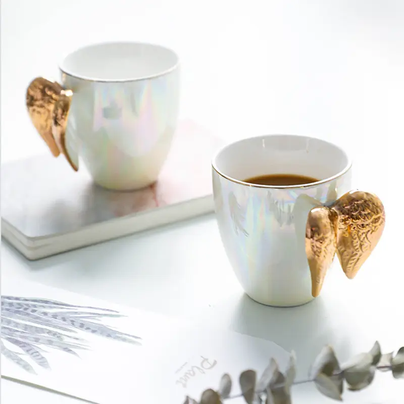 Neue hand bemalte Gold winkel flügel griff im nordischen Stil Porzellan-Kaffeetassen Keramik-Tee tassen mit goldenem Griff
