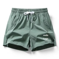 Shorts de sport pour hommes en vrac Shorts de sport à séchage rapide pour hommes avec poches Pantalons de course d'entraînement athlétique Shorts de motard