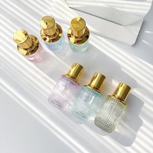 Color perfume <b>bottle</b> press <b>spray</b> <b>bottle</b> glass <b>empty</b> <b>bottle</b> sample <b>bottle</b> 30ml sub <b>bottle</b> portable cylindrical gold cap - Product Image 1