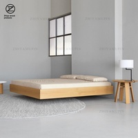 Lit tatami bas sans tête de lit en noyer noir de style nordique japonais, sur mesure pour chauffage au sol et gîtes