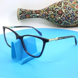 Venta al por mayor de moda de lujo rhinestone gafas de alta calidad acetato de metal mezcla de gafas montura de ojo de gato gafas ópticas para las mujeres
