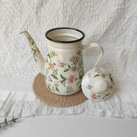 Vente en gros de luxe 1,2 L Cafetière en émail à motif personnalisé Bouilloire en fonte pour l'eau chaude pour la maison Camping en plein air