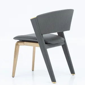 Chaise de salle à manger populaire à la maison de haute qualité chaise de loisirs à dossier haut rembourrée en cuir en acier inoxydable doré pour hôtel