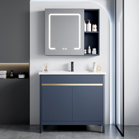 Ensemble de meuble de salle de bain moderne en aluminium pour hôtel Robinet de miroir intelligent Conception étanche Lavabo en céramique sur pied Lavabo