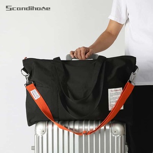Bolsa de viaje de gran capacidad para hombres y mujeres, bolso de hombro impermeable con correa naranja, equipaje informal para el trayecto diario - Product Image 4