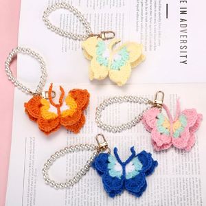 Cute Handmade Knitted Yarn Crochet Butterfly <b>Keychain</b> with Pearl Wrist Strap Pendant Backpack Handbag Purse Bag Charm Key Chain - Product Image 1