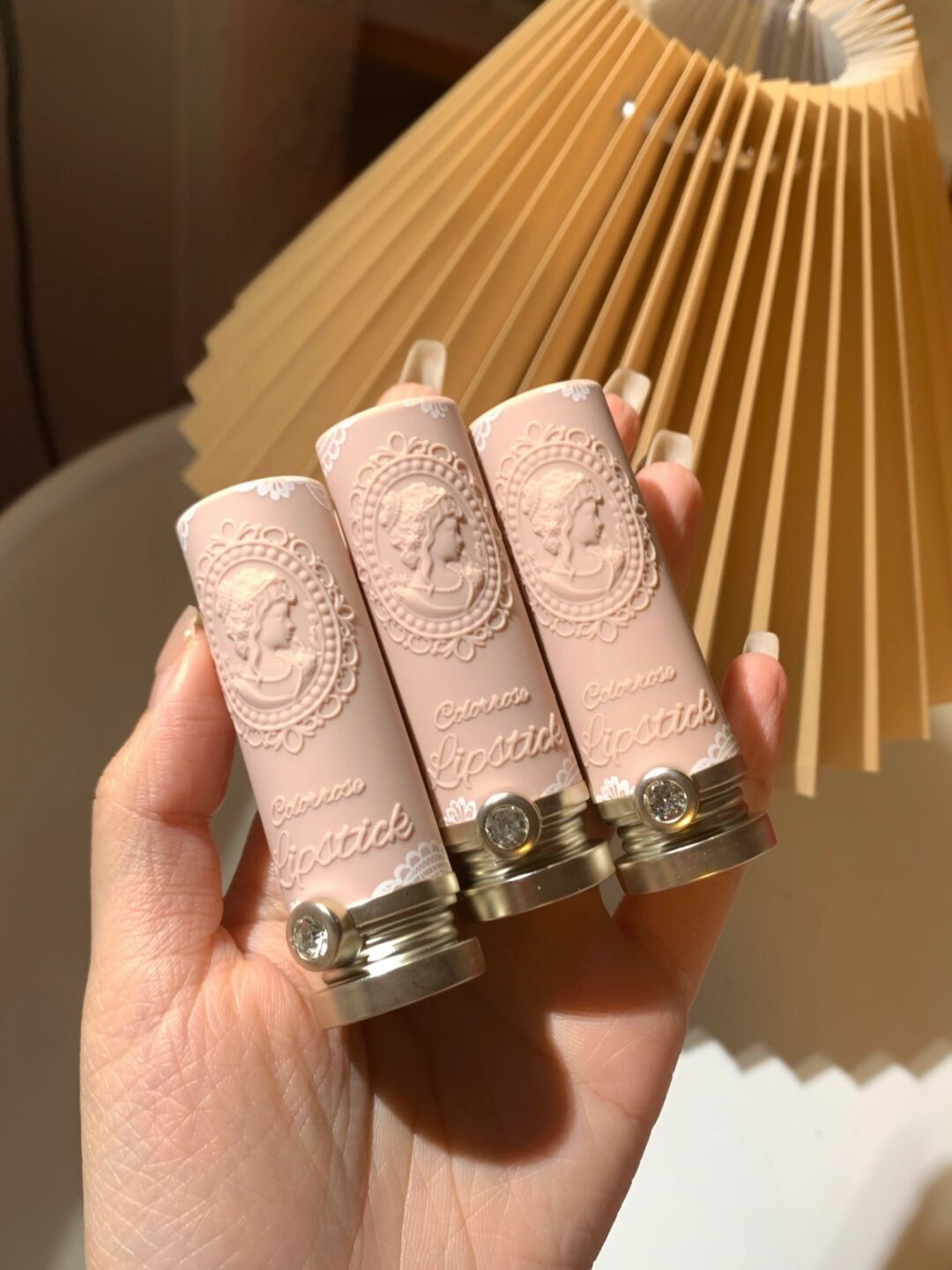 lipstick container embossed