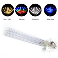 Guirlandes lumineuses LED 8 tubes effet pluie de météores pour la décoration de sapins de Noël en extérieur