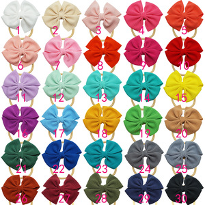 Serre-têtes pour enfants européens et américains, en polyester, mignons, couleur bonbon, design tendance, élastiques, pour bébés, vente en gros - Product Image 1