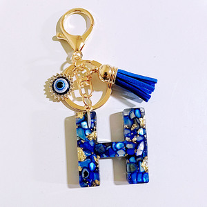 Llavero de moda con letras inglesas, borla y colgante de ojo turco, de aleación de zinc, con diseño de dibujos animados vintage en azul real, superventas transfronterizo. - Product Image 2