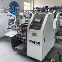 Machine de rembobinage automatique de film de masquage pré-encollé pour la protection de la peinture des voitures et des murs