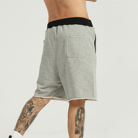 Shorts de sport amples décontractés à bords bruts bicolores style hip-hop de marque américaine tendance pour logo personnalisé