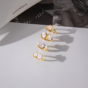 Bague en acier inoxydable plaqué or 18 carats avec zircon blanc, forme géométrique goutte d'eau, sertie à griffes, bijou unisexe pour fiançailles - Product Image 4