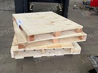 Machine automatique de stockage et de récupération de palettes pour la manutention de palettes vides