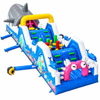 Toboggan aquatique gonflable Ceyu avec entrée en forme de bouche de requin, imprimé animaux marins, arche ondulée et zone de saut pour la location de fêtes pour enfants