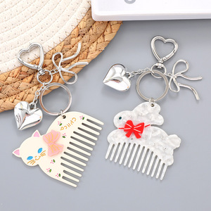 Cartoon Katze Hase Mini-Kamm Schlüsselanhänger Silber Herz Schleife Metallverschluss Taschenanhänger Tragbarer Taschen-Haarpflegekamm Süßer Stil - Product Image 1