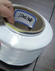 Hilo de Poliéster Texturizado Retorcido Reciclado con Certificado GRS 150/48 para Etiquetas de Tejido - Product Image 6