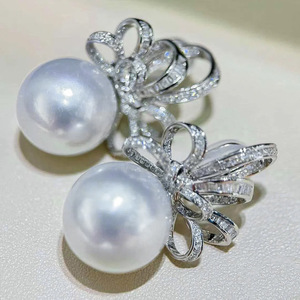 Orecchini a perno con fiocco e perline per donna, design dolce ed elegante, accessori per l'orecchio da indossare tutti i giorni - Product Image 1