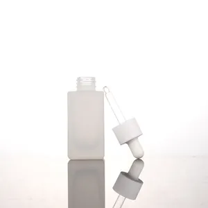 Bouteille d'huile de sérum rectangulaire givrée transparente personnalisée de 1oz, flacon compte-gouttes cosmétique en verre de 30ml de couleur blanc rose avec emballage en boîte