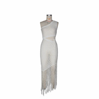 Robe longue tricotée à épaules dénudées pour fêtes sur la plage, style européen et américain, avec découpes ajourées révélant la taille et volants irréguliers