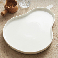 Assiette à dessert en porcelaine esthétique en forme de poire, créative et minimaliste, motif silhouette de fruit, en céramique écologique brillante, pour snacks, salades et fêtes
