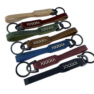 Porte-clés en cuir de <span class=keywords><strong>vachette</strong></span> <span class=keywords><strong>double</strong></span> couche, fait main, style international, design simple et créatif, cadeau de mode, pendentif tendance pour voiture, Henan - Product Image 1