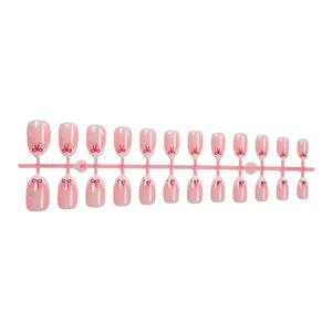 24 <span class=keywords><strong>Uñas</strong></span> <span class=keywords><strong>Postizas</strong></span> Cortas Color Nude Rosa Blanco <span class=keywords><strong>con</strong></span> Diseño <span class=keywords><strong>de</strong></span> Lazo Rojo, Cobertura Completa, Removibles, Reutilizables, <span class=keywords><strong>de</strong></span> Plástico ABS <span class=keywords><strong>de</strong></span> Alta Calidad - Product Image 4
