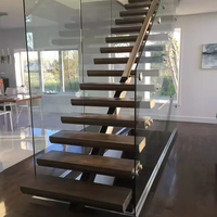 Moderne U-förmige Innentreppe aus Stahl und massivem Holz mit Glas geländer für Villen und Wohnungen