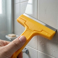 Couteau à mastic rétractable en plastique pour éliminer la saleté des sols, des vitres et des fenêtres