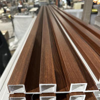 Panneau de mur Wpc cannelé de revêtement composite imperméable en plastique en bois d'intérieur Offre Spéciale