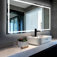 Miroir de salle de bains LED intelligent à éclairage rectangulaire à bas prix personnalisé en usine avec affichage de l'heure de désembuage et Bluetooth