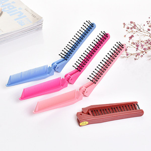 Peigne de voyage compact pliable à double tête, grand peigne à cheveux en plastique pour le voyage avec fonction clip - Product Image 1