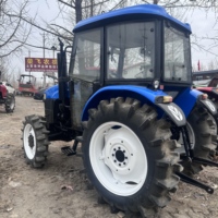 Tracteur agricole multifonctionnel Shanghai 4 cylindres 704 4x4 70 CV avec moteur diesel, boîte de vitesses et système hydraulique