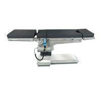 Table d'opération électro-hydraulique en alliage d'aluminium à 5 sections avec plateau en fibre de carbone et capacité de charge de 350 kg pour la chirurgie