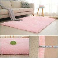 Vente en gros de tapis moderne en polyester rose moelleux avec cheveux super longs fabriqués à la machine, de couleur unie et hirsute, pour le salon de l'enfant