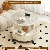 Table basse ronde mobile moderne de style crème à double niveau avec rangement en métal et roulettes universelles pour la maison