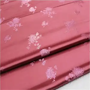 In-stock fornitore cinese prezzo intero bellissimo tessuto broccato Jacquard floreale di buona consistenza per vestito Tang