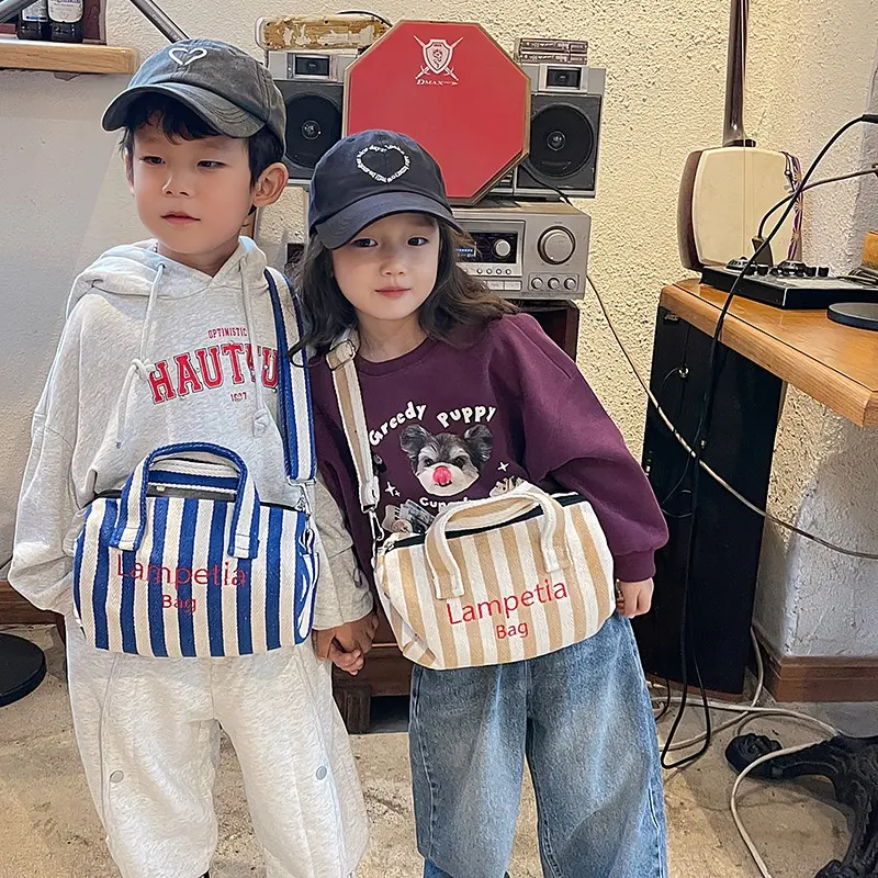 Kinder Koreaanse Mode Instagram Celebrity Boy Meisje Hand Met Crossbody Emmer Kussen Borduurwerk Alfabet Tas