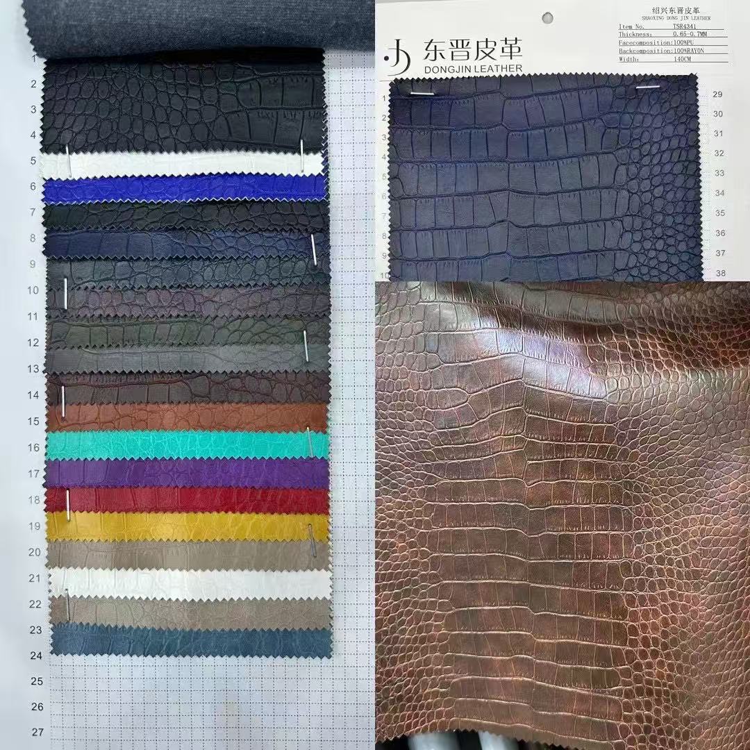 PFAS FREE Hot Selling Rayon Backing Crocodile Fabric Faux Synthetic Leather for Jacket Roll Packing Ready Goods