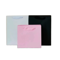 Sacs en papier imprimés de magasin de marque personnalisés en usine et vos propres sacs en papier à provisions en carton avec logo et sacs-cadeaux