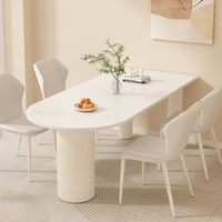 Ensemble table à manger et îlot de cuisine intégrés en pierre frittée moderne, mobilier crème français pour la maison