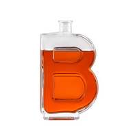 Lettre de qualité supérieure a B S W en forme de bouteilles en verre vides d'alcool Tequila Brandy Whisky Bouteilles en verre d'alcool personnalisées de 750ml Vodka Spirit Glass