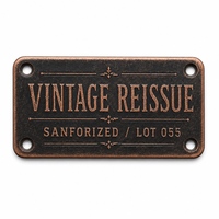 Plaque métallique sérigraphiée avec finition texturée, pour marquage de produits de créateurs, avec fixation par rivets