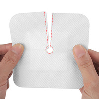 Pansement adhésif perforé intégré en tissu non tissé pour tube de drainage ; Pansement de fixation pour cathéter externe de dialyse péritonéale